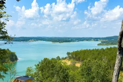 Douglas Lake’s iconic turquoise waters.  Known for its rare blue-green hue, the lake shimmers in the sunlight and creates a breathtaking backdrop you won’t forget.