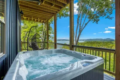 Relax in the bubbling hot tub while the lake and mountains stretch out before you.  Whether it's a slow morning or a quiet night, this view-soaked deck invites pure serenity.