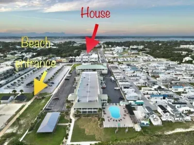 Steps from the sand!  Our condo is just a short 5-minute walk to the public beach access—so you can go from your door to the shore in no time!