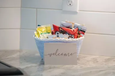 Small details, big hospitality!  Enjoy a curated snack basket and a heartfelt welcome card—just one of the ways we make you feel at home from the moment you arrive.