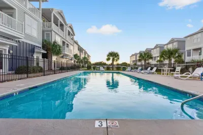 Pool views, beach vibes, and local bars & shops just a few steps away!  Stay where comfort and style meets coastal charm and serenity.