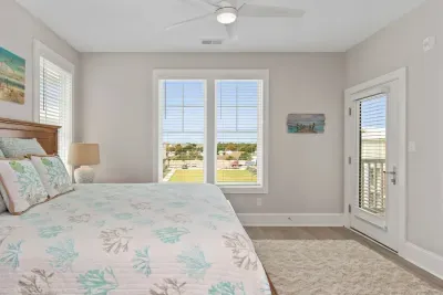 Sleep like royalty in this cozy king bed!  Wake up to pool views and step right onto your private balcony for a breath of fresh coastal air.