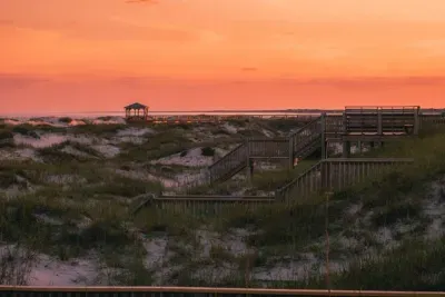 Enjoy sunset views while on an evening beach walk!