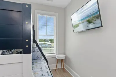 Big fun for the little ones - our kids’ bunk room also comes with a 43" Roku TV — perfect for winding down for their favorite shows after a long day at the beach.