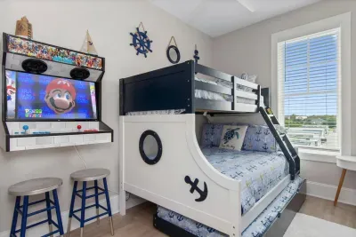 Nostalgia alert!  Play old-school Nintendo, Super Nintendo, N64, & PlayStation games in our bunk room arcade. The perfect mix of beach days & game nights!