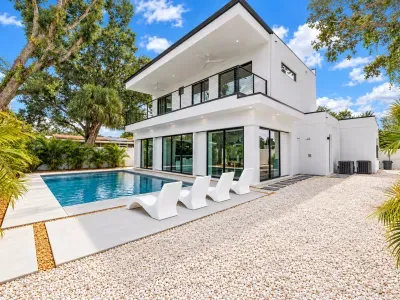 Modern luxury retreat with private pool, balcony, and tropical style