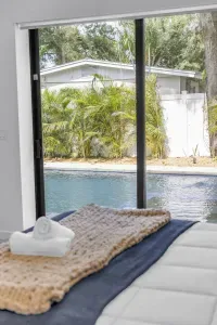 Wake up to pool views and tropical greenery right outside your room