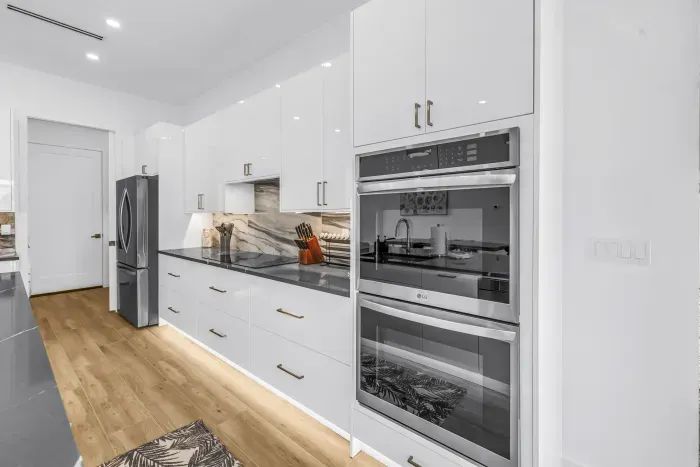 Bright modern kitchen with sleek finishes and premium appliances