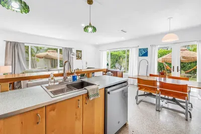 Bright open kitchen and dining space with garden views