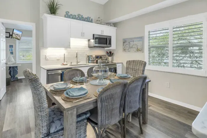 Dining Area: Enjoy meals with flair at this stylish table adorned with beachy accents!