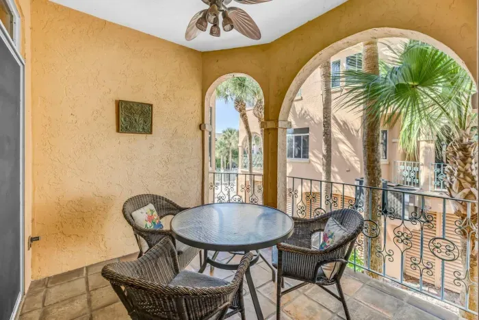 Private Balcony Retreat: Savor morning coffee amidst swaying palms and vibrant decor!