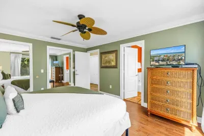 Bedroom Retreat: Enjoy serene décor and a view from this stylish, bright sanctuary!