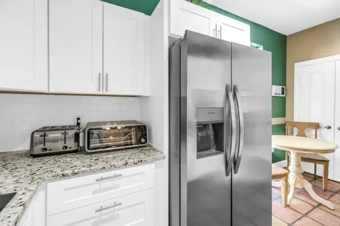 Kitchen Delight: Modern appliances and a charming breakfast nook for culinary adventures!
