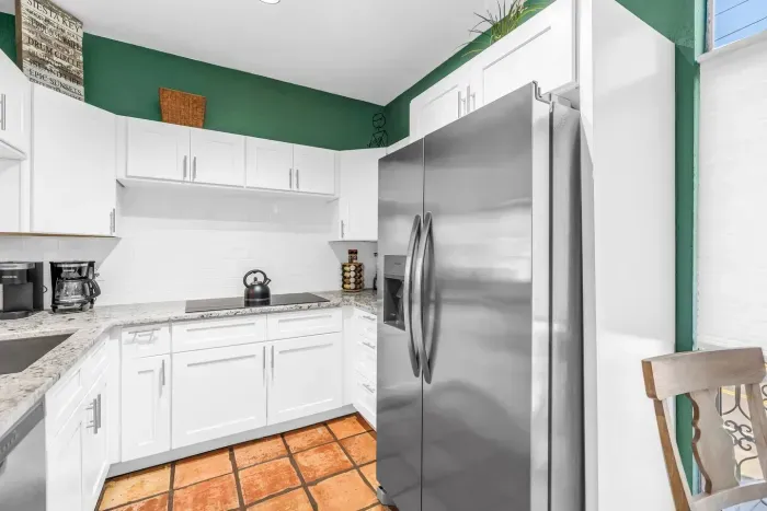 Gourmet Kitchen: Whip up seaside feasts in this stylish space with chic decor and modern appliances!