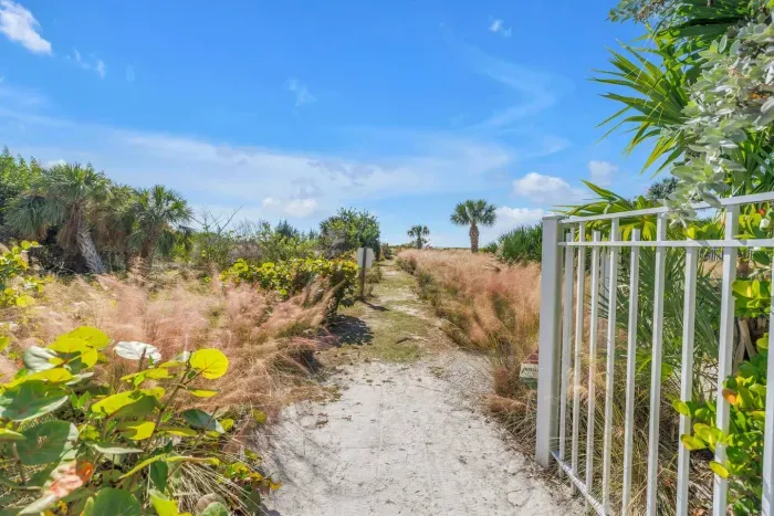 Garden Pathway: Discover your personal paradise leading to sun-kissed shores and vibrant nature!