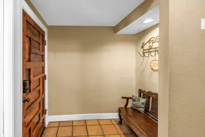Entryway Delight: Step into elegance with vintage charm and inviting warmth!