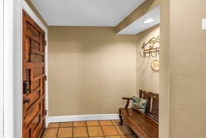 Entryway Delight: Step into elegance with vintage charm and inviting warmth!