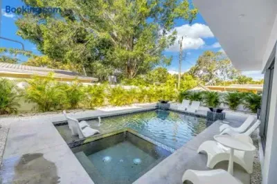 Outdoor Oasis: Dive into your private pool and bask in the Florida sun, surrounded by lush greenery!