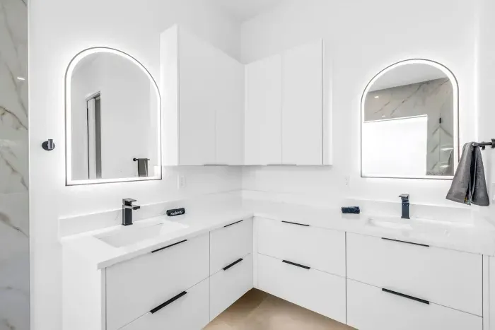 Bright kitchen corner w/ crisp cabinetry and plenty of prep space.