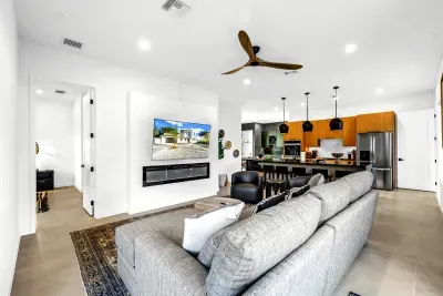Bright modern living area with open kitchen and spacious island seating