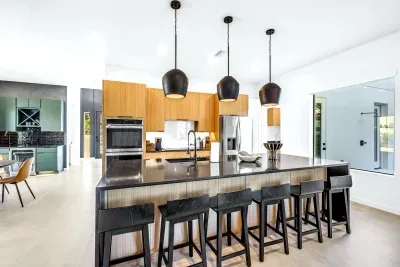 Spacious designer kitchen with oversized island and seating for 6