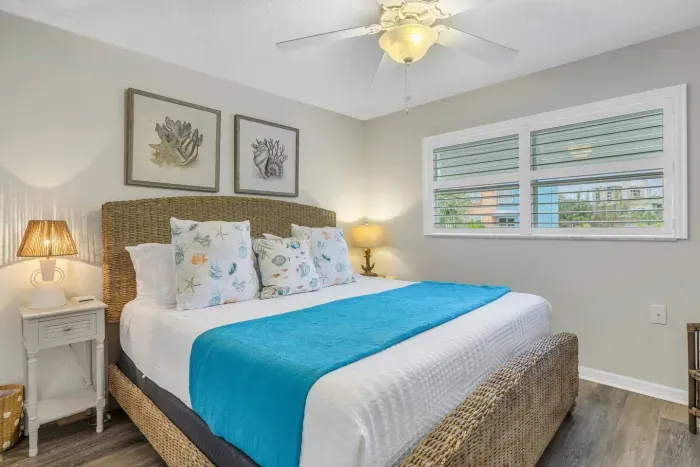 Bedroom Retreat: Bright and inviting space with beachy décor, perfect for restful nights in paradise!