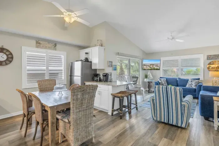 Living Room & Kitchen #2: Bright and airy space with stylish decor and views of tropical palms!