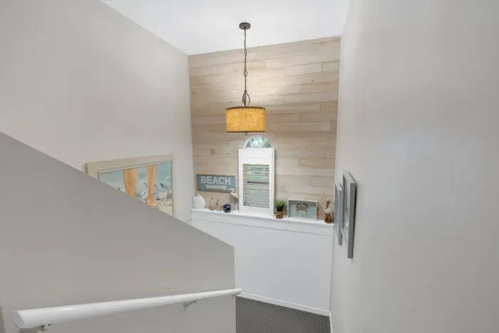 Entryway Oasis: Discover beach-inspired decor and natural light as you step into paradise!