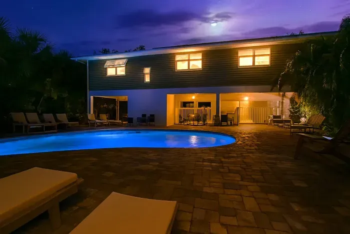 Backyard Oasis: Dive into relaxation with a sparkling pool and evening ambiance under the stars!