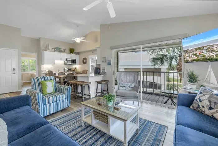 Living Room: Bright and airy space with tropical vibes, perfect for relaxation and fun gatherings!