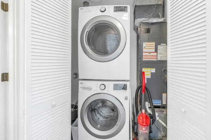Laundry Room: Effortless laundry days with stackable machines for your convenience!