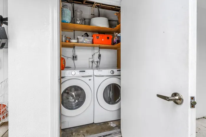 Convenient in-home washer/dryer with handy storage shelves