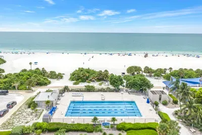 Sweeping ocean views with white-sand beach and resort-style lap pool