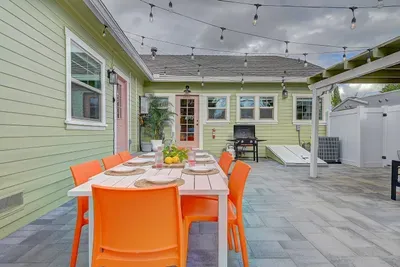 I know what you're thinking, the dining table seats 8 but the house sleeps 12. Well, we all know that the dads are going to sit on the couch and watch the game. But seriously, magical dinners happen here under the string lights and stars.