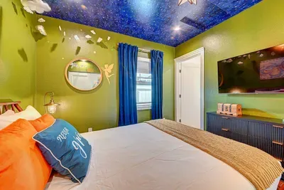 Stay young at heart with a queen bed, private bath, and plenty of Disney whimsy.