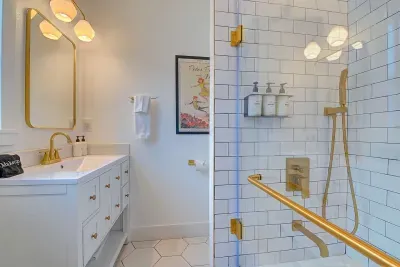 Don't you just love brushed gold? Since this bathroom is attached to Neverland, we have a Peter Pan poster for you.