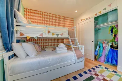 Dress like a princess, cook like a chef, and sleep like a world traveler—this room has it all.
