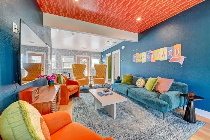 Step into Walt’s living room—retro vibes, iconic posters, and a little Disney nostalgia to make you feel right at home.