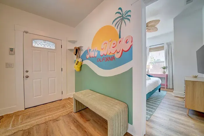 We painted this mural ourselves for your selfie inspo!