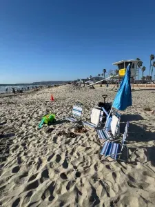 Beach supplies: wagon, umbrella, 4 folding chairs, beach towels, beach basket, sand toys