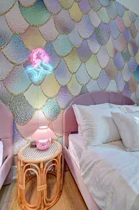 Calling all mermaids—this room is your underwater escape.