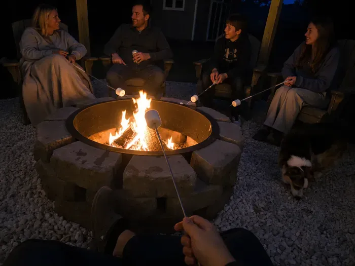 Cozy backyard fire pit perfect for s’mores, stories, and relaxing evenings