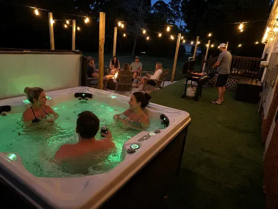 Soak in the hot tub, grill out, and unwind by the fire under string lights