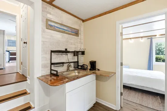 Convenient coffee nook and sink area just steps from the cozy bedroom