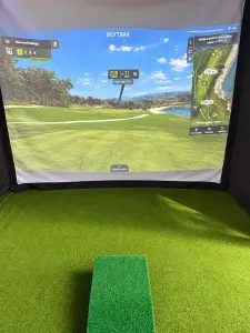 Private indoor golf simulator for year-round play and entertainment
