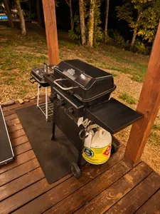 Private covered deck with propane grill for easy outdoor cookouts