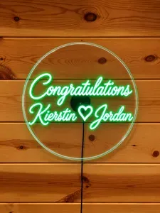 Custom neon sign adds a romantic, celebration-ready touch