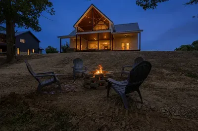 Cozy fire pit evenings outside a stunning modern cabin retreat