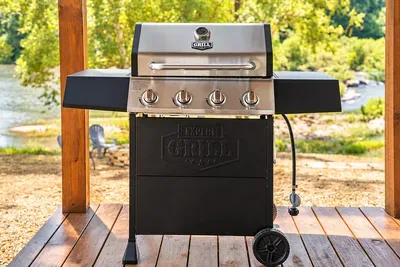Riverside deck with gas grill for easy outdoor dining