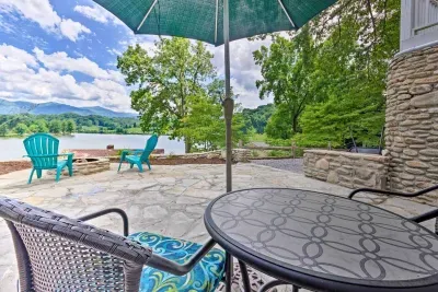 Dine with a view! Watch the clouds in the sky top over the mountains and towards the lake all from this stunning view!